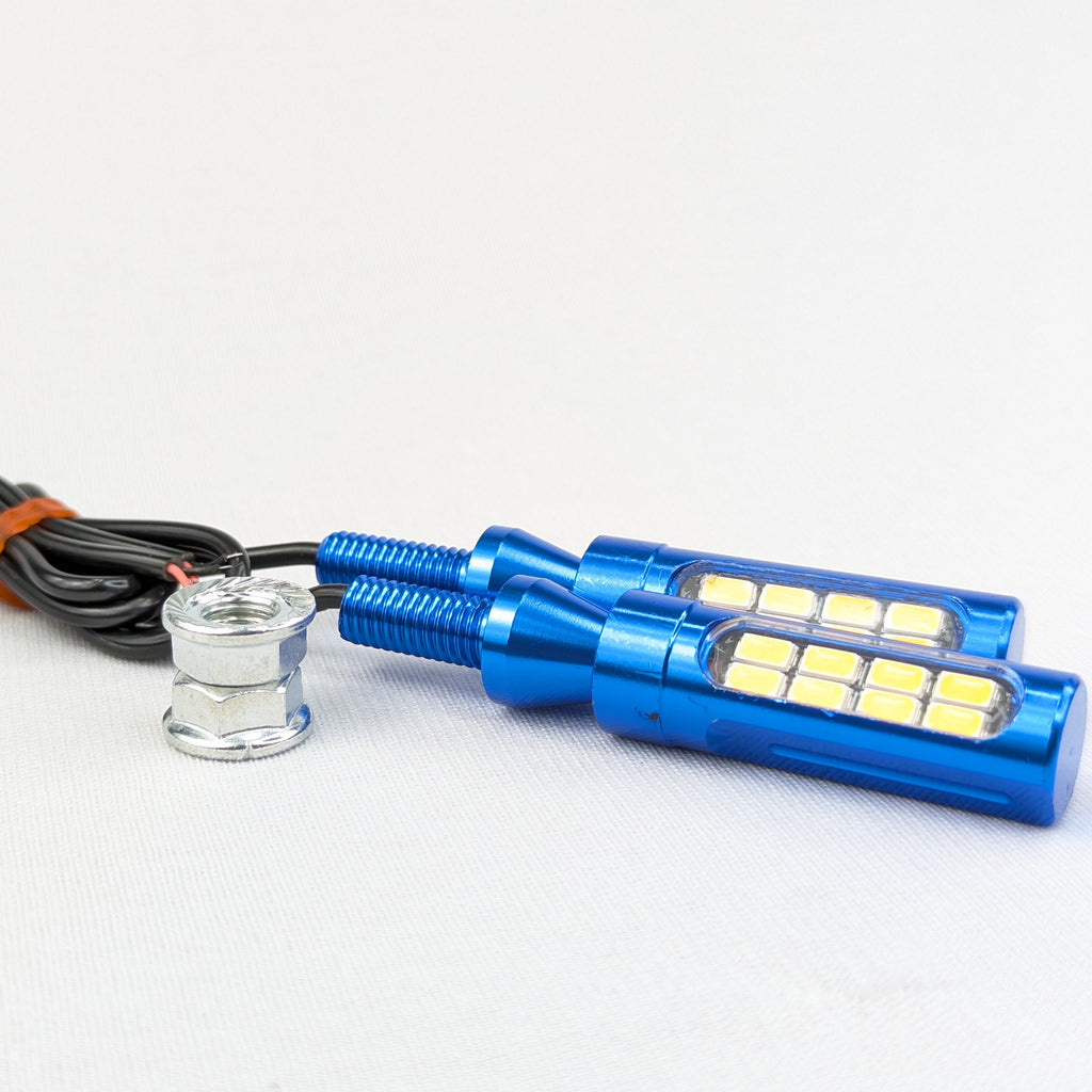 Blue LED light bulbs with wiring on a white background