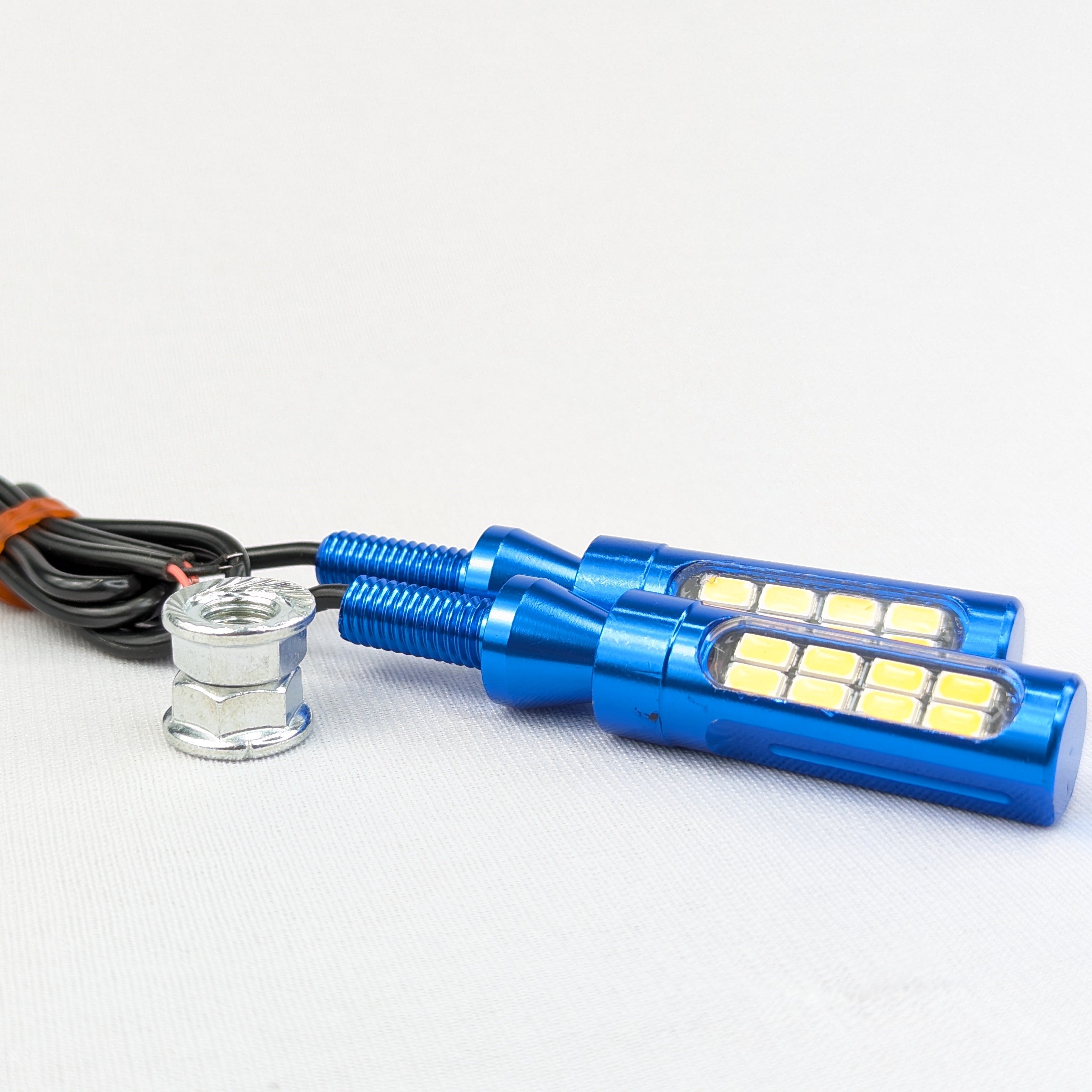 Blue LED light bulbs with wiring on a white background