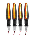Four amber LED turn signals with black casings on a white background