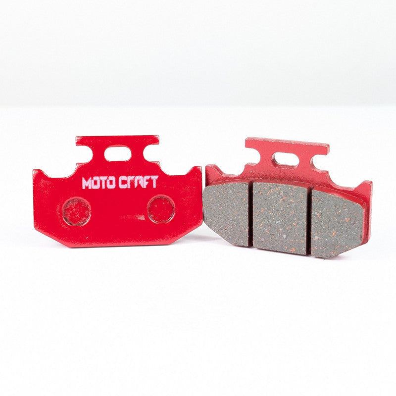 Moto Craft brake pads on a white background
