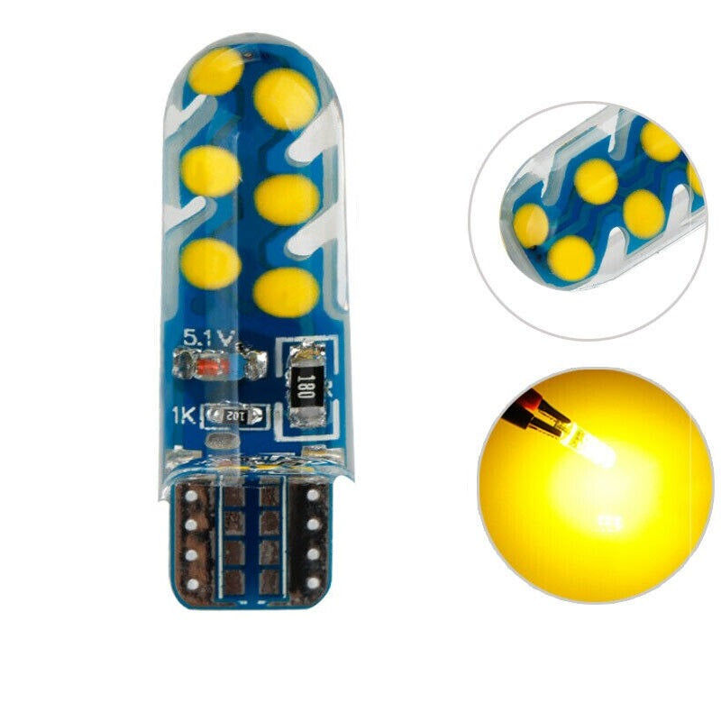 LED light bulb with yellow LEDs and electronic components on a white background