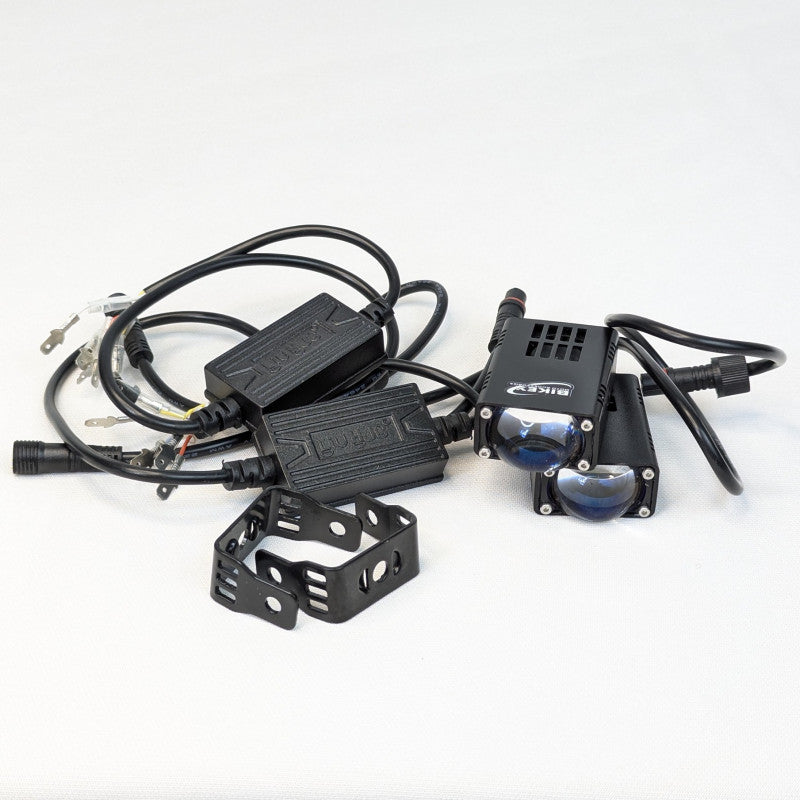 Electrical components including a power adapter, connectors, and a small electronic device on a white background.