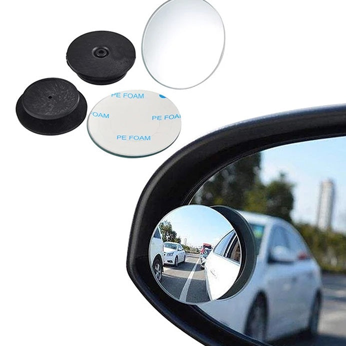 Car side mirror with a convex mirror attachment and additional mirrors and foam pads on a white background.