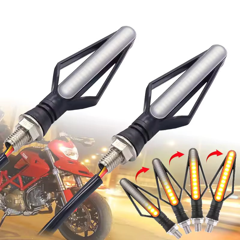 Motorcycle turn signals with LED lights on a blurred background of a motorcycle.