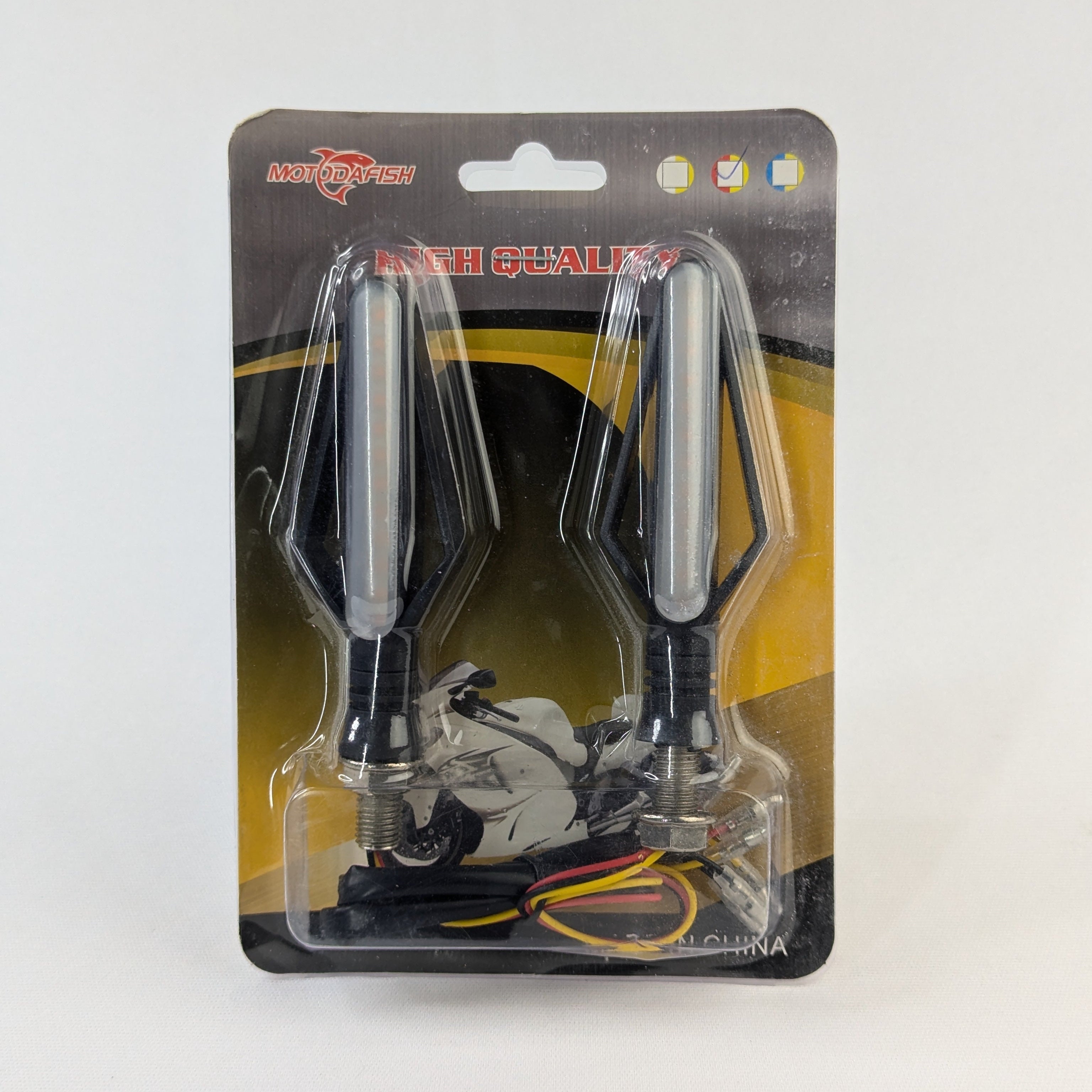 Two black archery broadheads in clear plastic packaging on a white background