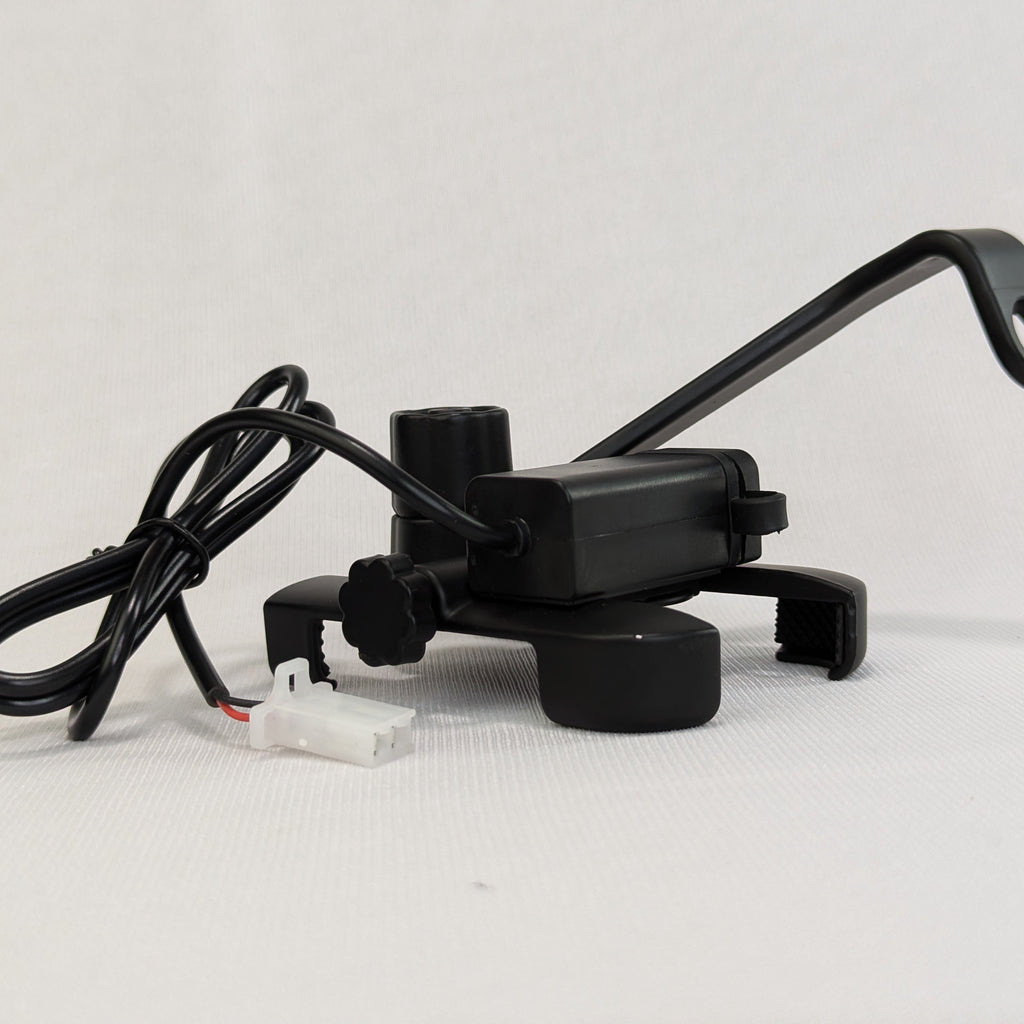 Black electronic device with a cable on a white background