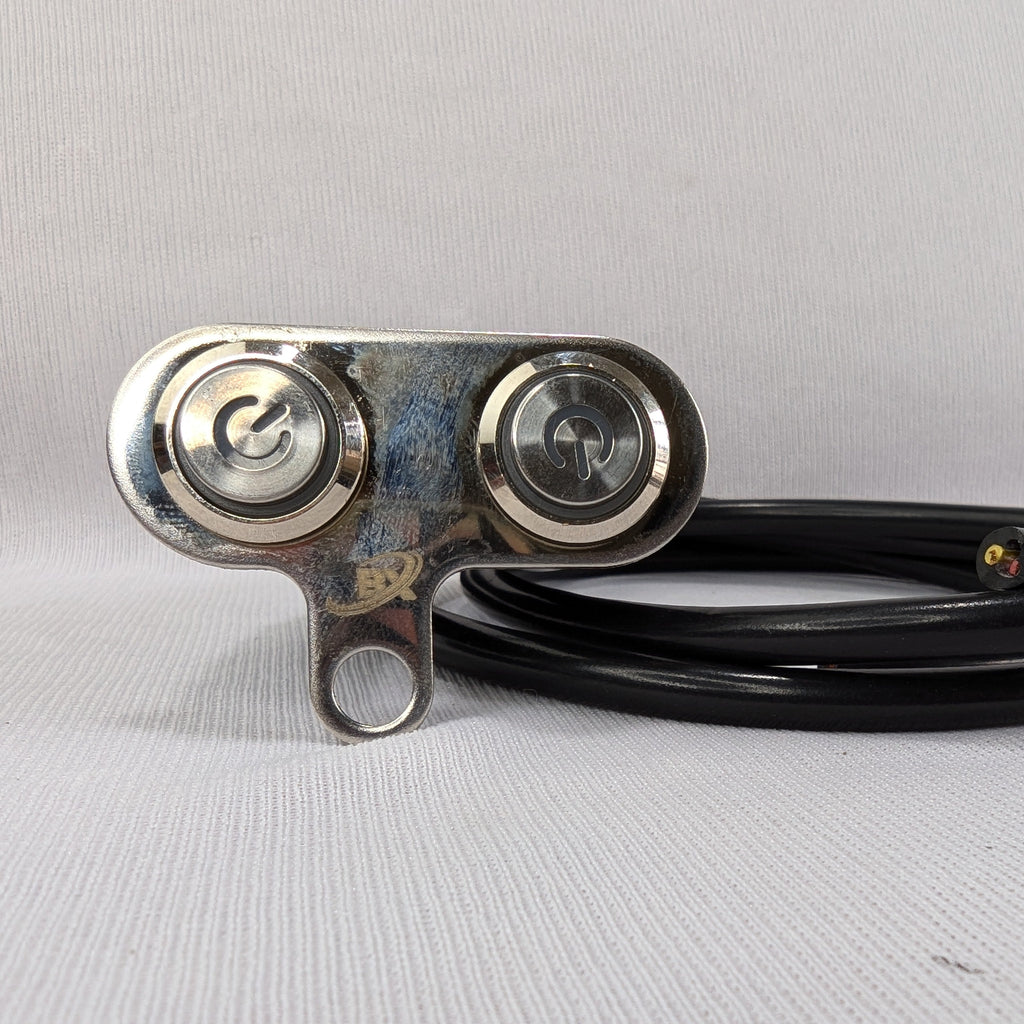 Metallic pulley system with black belt on a gray background