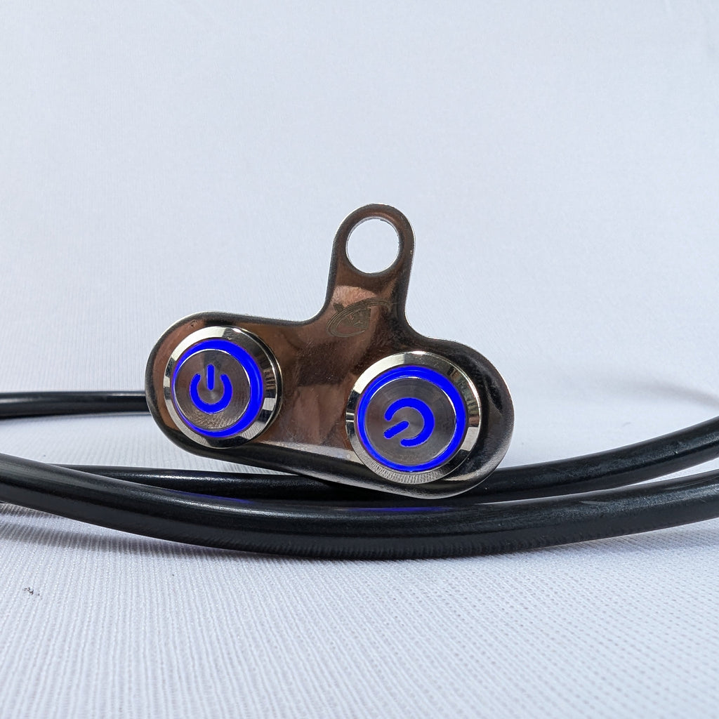 Close-up of earbud with blue spiral design on a light gray background