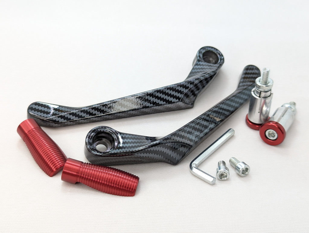 Carbon fiber components with red and silver fasteners on a white background