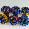 Set of colorful metal knobs on a white background